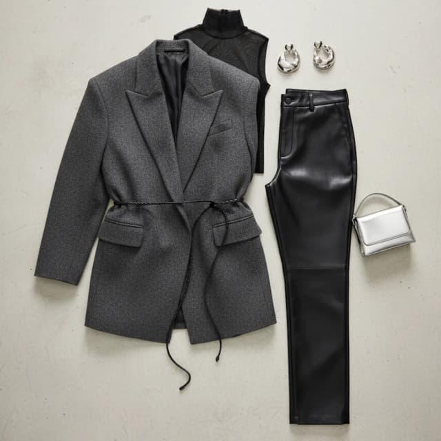 Original reference image for: AI generated image: Model standing on a sun-drenched minimalist metropolitan sidewalk with clean architectural lines and